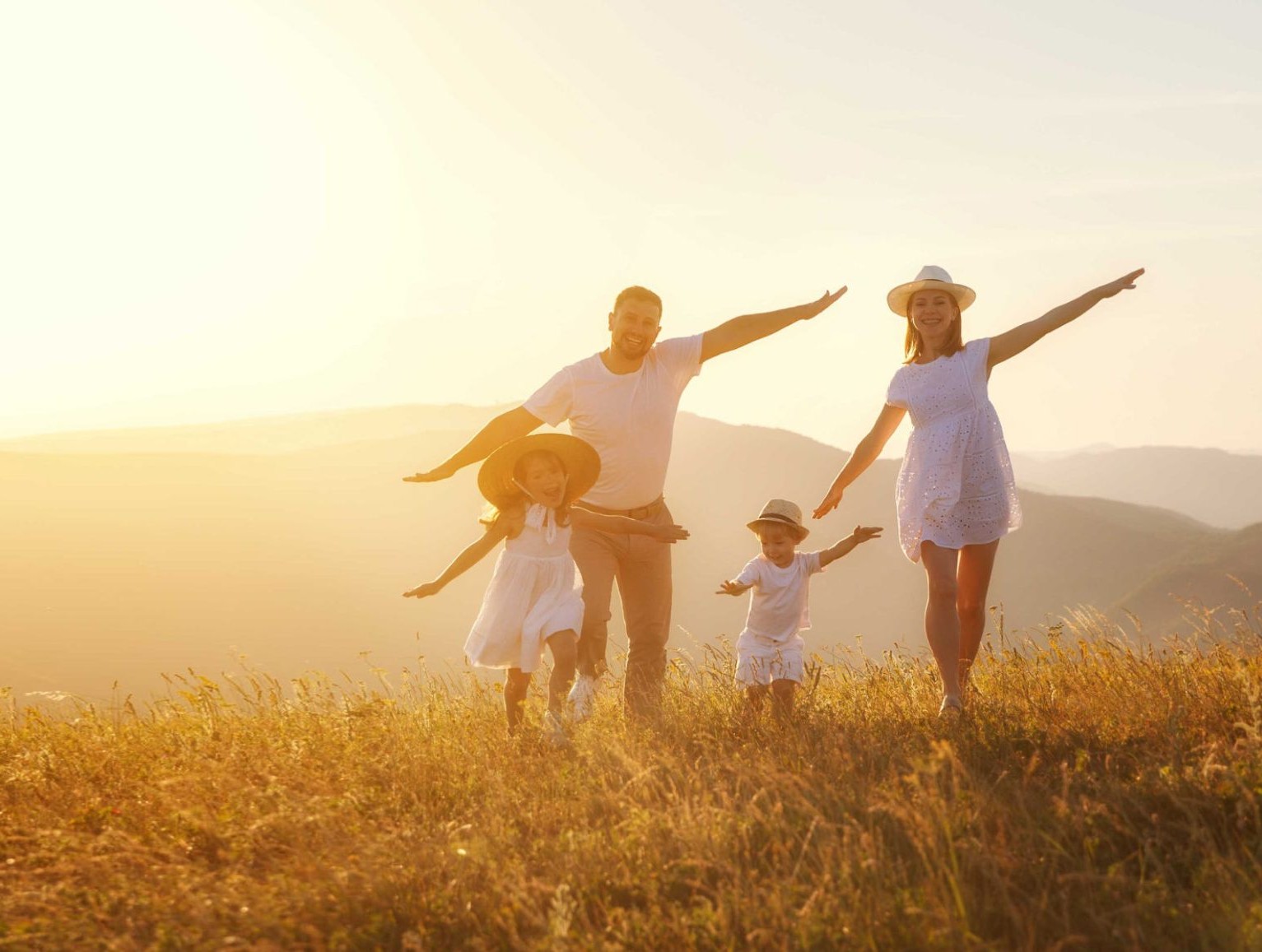 Happy family enjoying wellness and vitality together outdoors